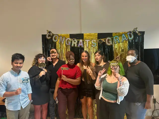 Naim Bin Hasan with fellow sociology graduate students at the FAU graduation celebration.