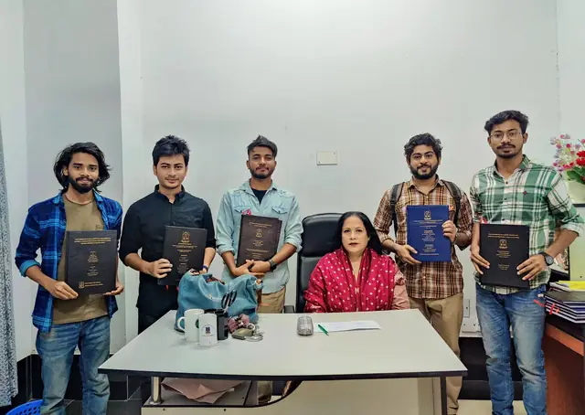 Naim Bin Hasan and classmates submitting their sociology monographs with faculty at the University of Dhaka.